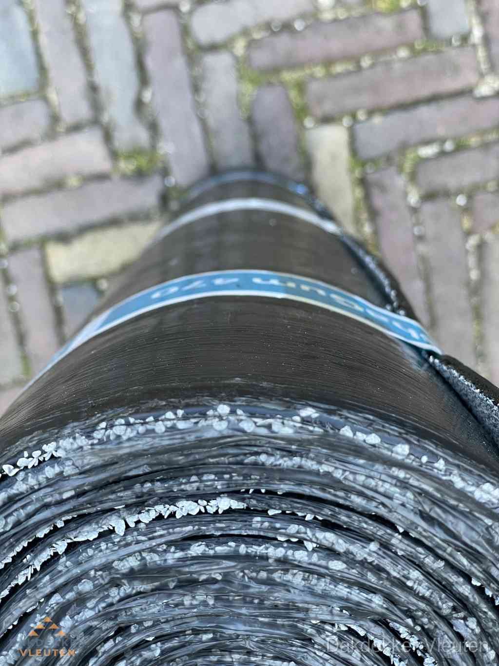 Rol bitumen dakleer met leislag voor plat dak in Vleuten Rol bitumen dakleer met leislag voor plat dak in Vleuten
